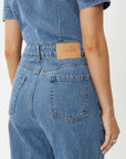 Miami Hemp Denim Flared Leg Jumpsuit Worn Blue