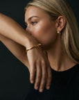 Linden Wave Bangle Gold
