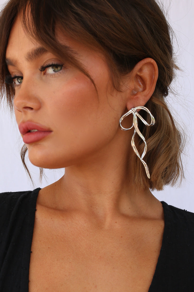 Take a Bow Earrings Silver